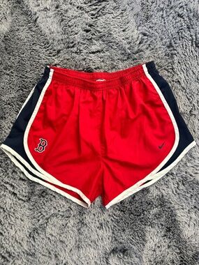 Nike Women's Red Athletic Shorts with Navy Panels and White Trim